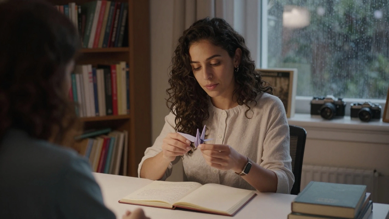 A woman of Algerian-French heritage teaches origami to a client in a cozy study, rain tapping the window as books and cameras surround them.